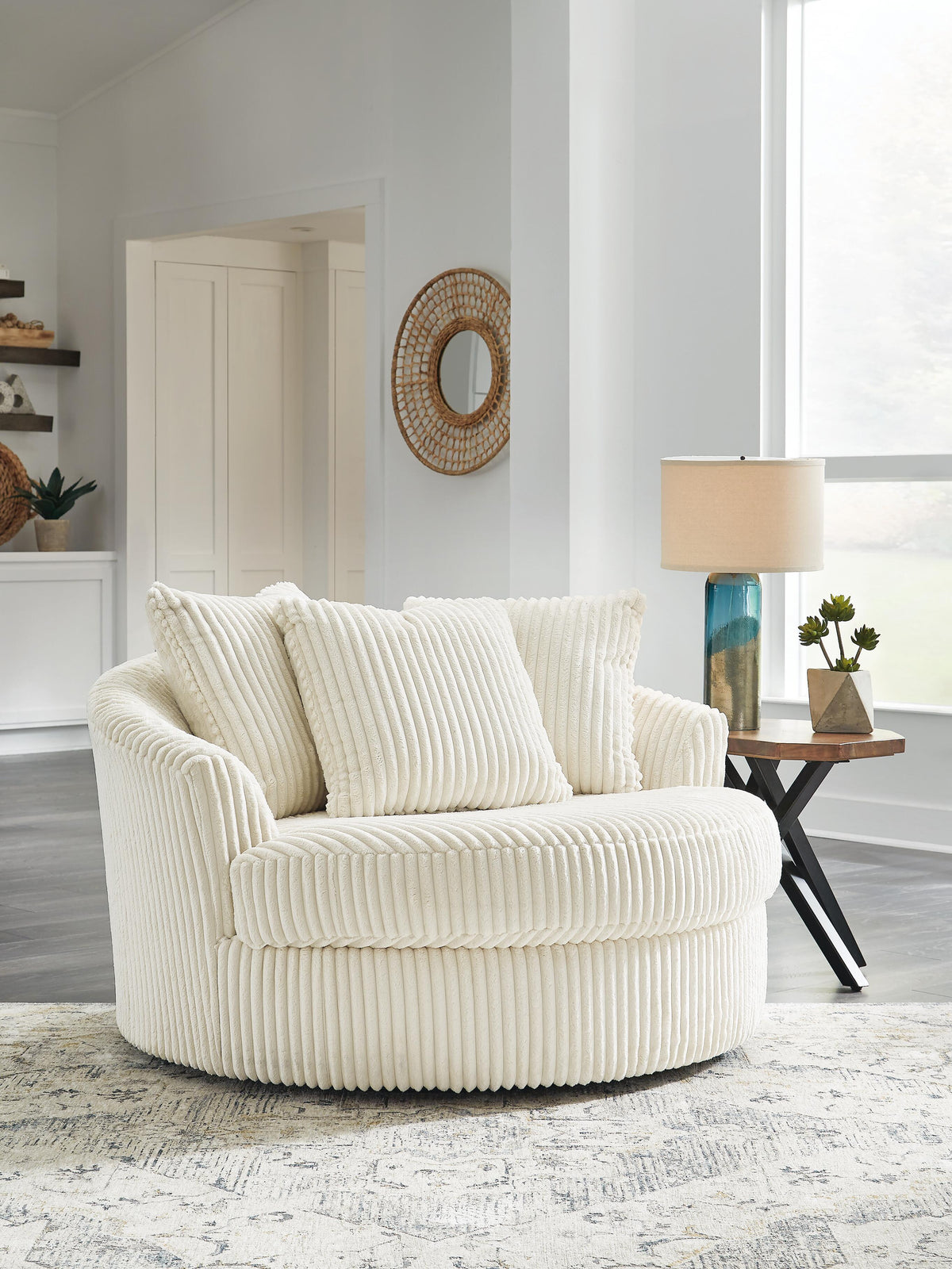Bawley Oversized Swivel Accent Chair in Ivory