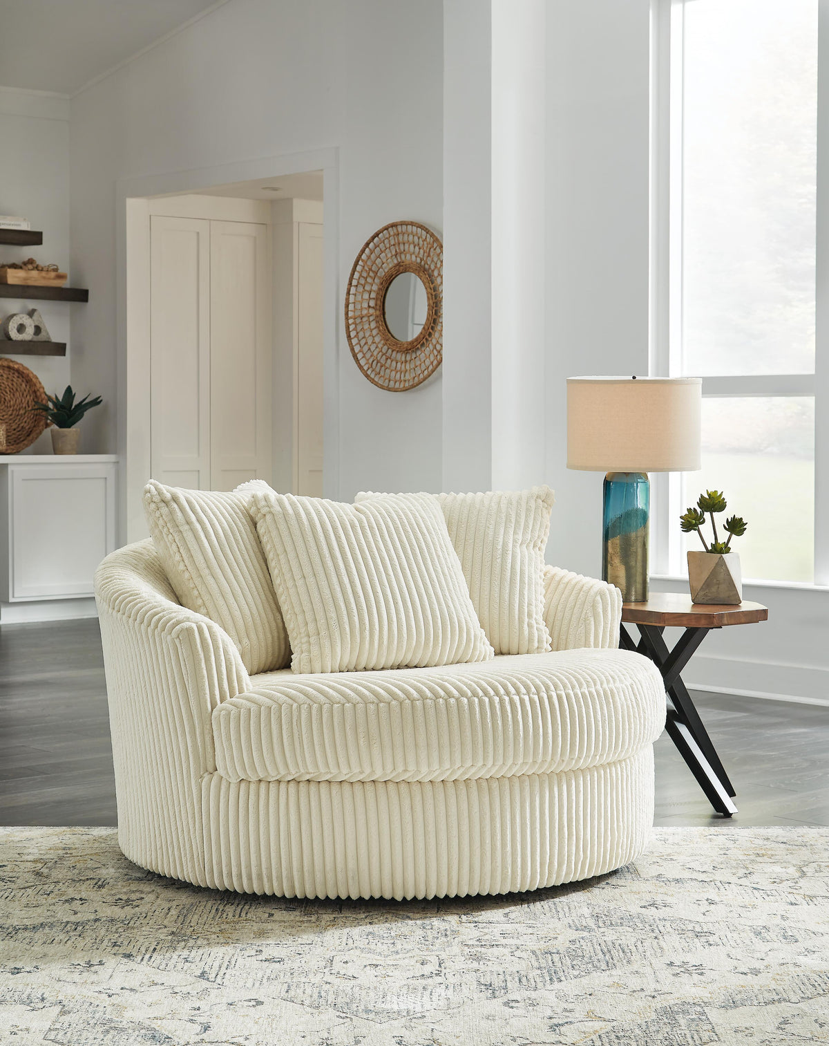 Bawley Oversized Swivel Accent Chair in Ivory