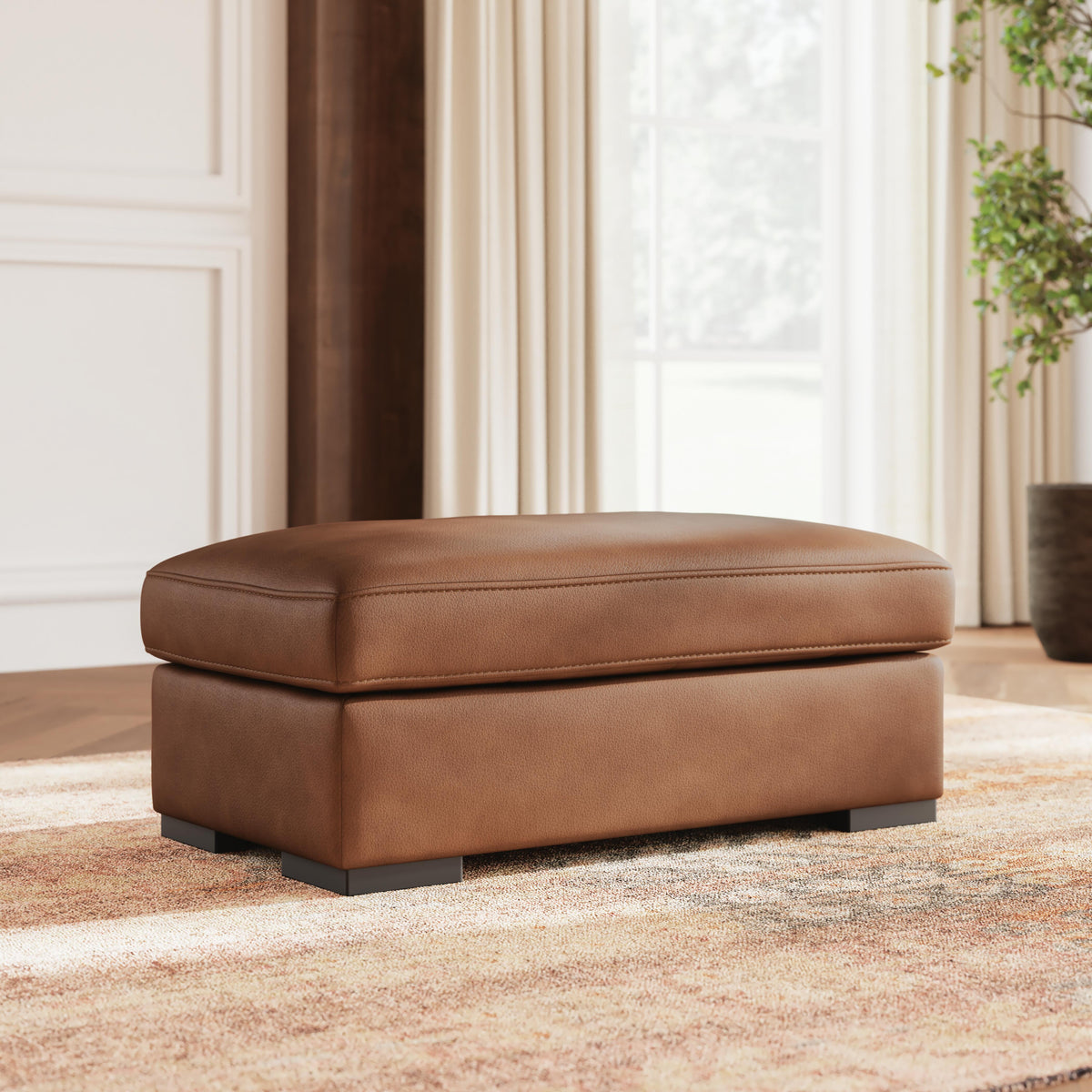 Auvelle Ottoman in Caramel
