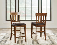Pennwick Counter Height Dining Table and 4 Barstools in Default