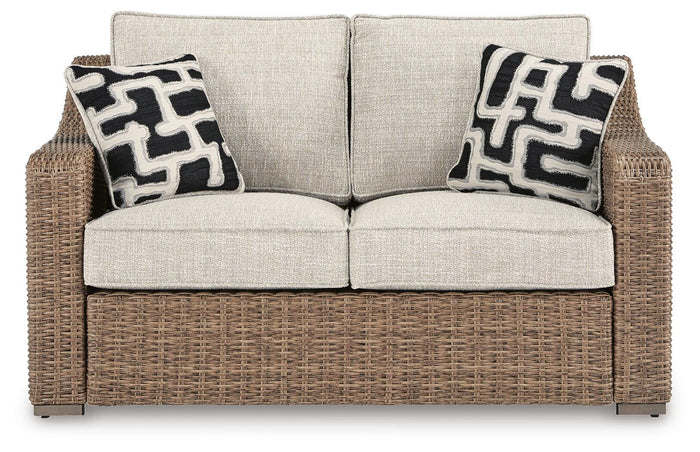 Tallowood Outdoor Loveseat with Cushion in Beige